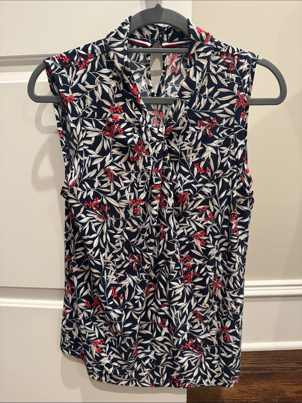Sleeveless Navy Floral Twist Tie-Neck Blouse